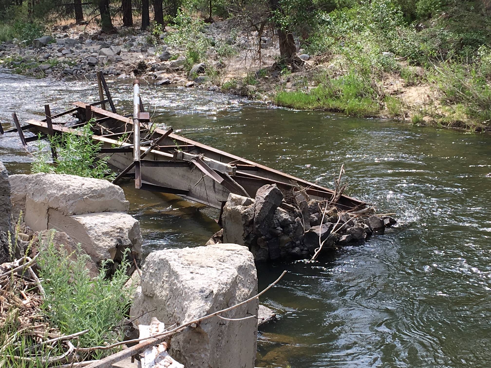 Washedout bridge removed from Mores Creek